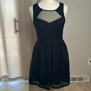 Black mini dress. May need to add small button to top back, but still works. 13.